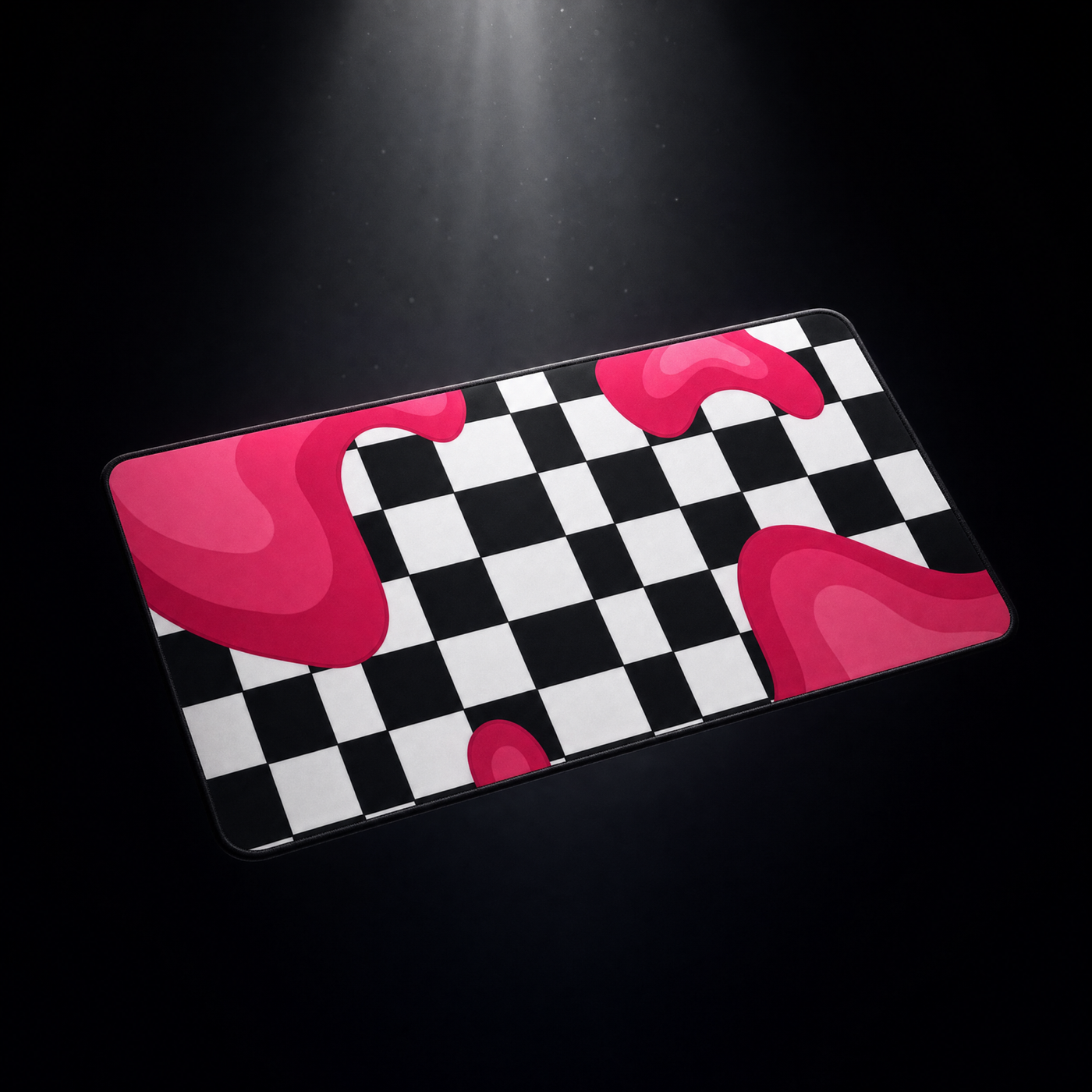 Checkered desk pad with pink drips